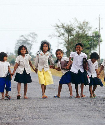 1992, Cambodia --- Children on their way to school, in Sihanoukville. --- Image by © Jose Nicolas/http://www.josenicolas.fr/Corbis